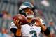 Philadelphia Eagles' Mark Sanchez smiles as he warms up before an NFL preseason football game against the Pittsburgh Steelers, Thursday, Aug. 21, 2014, in Philadelphia. (AP Photo/Matt Rourke)