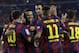 Barcelona's Lionel Messi from Argentina, left, celebrates with teammates scoring the opening goal during the Joan Gamper trophy friendly soccer match between Barcelona and Leon at the Camp Nou stadium in Barcelona, Spain, Monday, Aug. 18, 2014. (AP Photo/Emilio Morenatti)