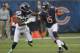 Chicago Bears wide receiver Brandon Marshall (15) is guarded by Seattle Seahawks cornerback Richard Sherman (25) in the first half of an NFL football game in Chicago, Sunday, Dec. 2, 2012. (AP Photo/Charles Rex Arbogast)
