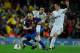 BARCELONA, SPAIN - APRIL 21: Andres Iniesta (L) of FC Barcelona battles for the ball against Angel di Maria (R) and Sami Khedira of Real Madrid CF during the La Liga match between FC Barcelona and Real Madrid CF at Camp Nou on April 21, 2012 in Barcelona, Spain. (Photo by Denis Doyle/Getty Images)
