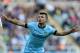 Manchester City's Sergio Aguero celebrates his goal during their English Premier League soccer match against Newcastle United at St James' Park, Newcastle, England, Sunday, Aug. 17, 2014. (AP Photo/Scott Heppell)