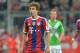 Bayern's Gianluca Gaudino walks through he pitchl during the soccer match between FC Bayern Munich and VfL Wolfsburg in the Allianz Arena in Munich, Germany, on Friday, Aug. 22, 2014. (AP Photo/Kerstin Joensson)