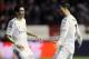 Real Madrid's Cristiano Ronaldo of Portugal, right, celebrates his goal with his fellow teammate Angel Di Maria of Argentina during their Spanish Copa del Rey round-16 second leg soccer match between Osasuna and Real Madrid at El Sadar stadium, in Pamplona, northern Spain, Wednesday, Jan. 15, 2014. (AP Photo/Alvaro Barrientos)