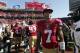 San Francisco 49ers quarterback Colin Kaepernick (7) walks off the field after an NFL preseason football game against the San Diego Chargers in Santa Clara, Calif., Sunday, Aug. 24, 2014. The 49ers won 21-7. (AP Photo/Marcio Jose Sanchez)