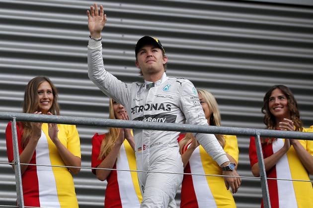 SPA, BELGIUM - AUGUST 24: Nico Rosberg of Germany and Mercedes GP waves to the crowd as he walks on to the podium after finsihing second in the Belgian Grand Prix at Circuit de Spa-Francorchamps on August 24, 2014 in Spa, Belgium. (Photo by Dean Mouhtaropoulos/Getty Images)
