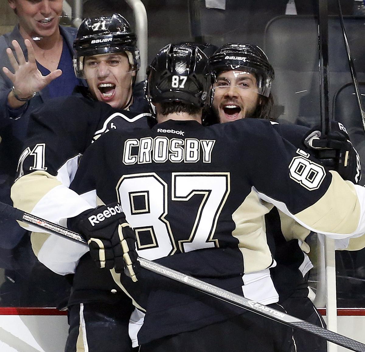 Pittsburgh Penguins Matt Cooke (center) celebrates with Brandon