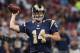 St. Louis Rams quarterback Shaun Hill passes against the New Orleans Saints in the first quarter of a preseason NFL football game Friday, Aug. 8, 2014, in St. Louis. (AP Photo/Scott Kane)
