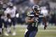 Seattle Seahawks' Percy Harvin runs against the Chicago Bears in the first half of an preseason NFL football game, Friday, Aug. 22, 2014, in Seattle. (AP Photo/Stephen Brashear)