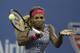 Serena Williams, of the United States, returns a shot to Taylor Townsend, of the United States, during the first round of the 2014 U.S. Open tennis tournament Tuesday, Aug. 26, 2014, in New York. (AP Photo/Darron Cummings)