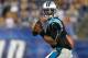 FOXBORO, MA - AUGUST 22: Cam Newton #1 of the Carolina Panthers looks for an open man against the New England Patriots in the first quarter at Gillette Stadium on August 22, 2014 in Foxboro, Massachusetts. (Photo by Jim Rogash/Getty Images)