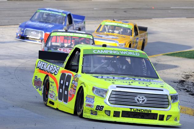 Driver Matt Crafton driver through turn four during a NASCAR Truck Series auto race at Martinsville Speedway in Martinsville, Va., Sunday, March 30, 2014. (AP Photo/Mike McCarn)