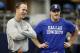 Denver Broncos' Peyton Manning, left, chats with Dallas Cowboys' Jason Witten, right, before a NFL preseason football game, Thursday, Aug. 28. 2014, in Arlington, Texas. (AP Photo/Brandon Wade)