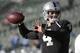 Oakland Raiders quarterback Derek Carr (4) before an NFL preseason football game against the Detroit Lions in Oakland, Calif., Friday, Aug. 15, 2014. (AP Photo/Marcio Jose Sanchez)