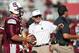 Spurrier (right) has some work to do.