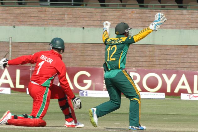 South African wicketkeeper Quinton de Kock, right, appeals for the wicket of Zimbabwean batsman Brendan Taylor during the cricket One Day International match against Zimbabwe in Harare, Zimbabwe, Friday, Aug. 29, 2014.(AP Photo/Tsvangirayi Mukwazhi)