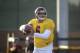 Southern California quarterback Cody Kessler throws a pass during NCAA college football practice Wednesday, Aug. 20, 2014, in Los Angeles. (AP Photo/Jae C. Hong)