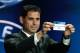 Former Real madrid captain Fernando Hierro, shows the name of Manchester City, who will play Group E, during the UEFA Champions League draw at the Grimaldi Forum, in Monaco, Thursday, Aug. 28, 2014. (AP Photo/Claude Paris)