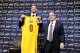 INDEPENDENCE, OH - AUGUST 26: Kevin Love #0 of the Cleveland Cavaliers holds up his new jersey as he is introduced to the media alongside General Manager David Griffin at The Cleveland Clinic Courts on August 26, 2014 in Independence, Ohio in Cleveland, Ohio. NOTE TO USER: User expressly acknowledges and agrees that, by downloading and/or using this Photograph, user is consenting to the terms and conditions of the Getty Images License Agreement. Mandatory Copyright Notice: Copyright 2014 NBAE (Photo by David Liam Kyle/NBAE via Getty Images)