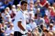 NEW YORK, NY - AUGUST 28: Novak Djokovic of Serbia reacts after defeating Paul-Henri Mathieu of France during their men's second round match on Day Four of the 2014 US Open at the USTA Billie Jean King National Tennis Center on August 28, 2014 in the Flushing neighborhood of the Queens borough of New York City. (Photo by Elsa/Getty Images)