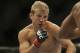 T.J. Dillashaw fights Hugo Viani during the first round of a UFC bantamweight mixed martial arts fight in San Jose, Calif., Saturday, April 20, 2013. (AP Photo/Jeff Chiu)