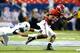 ATLANTA, GA - AUGUST 30: DeAndrew White #2 of the Alabama Crimson Tide rushes away from Terrell Chestnut #16 of the West Virginia Mountaineers at Georgia Dome on August 30, 2014 in Atlanta, Georgia. (Photo by Kevin C. Cox/Getty Images)