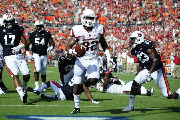 Aug 30, 2014; Auburn, AL, USA; Arkansas Razorbacks running back Jonathan Williams (32) scores a touchdown in the second quarter against the Auburn Tigers at Jordan Hare Stadium. Mandatory Credit: Shanna Lockwood-USA TODAY Sports