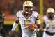 ARLINGTON, TX - AUGUST 30: Jameis Winston #5 of the Florida State Seminoles runs for a touchdown against the Oklahoma State Cowboys in the second half of the Advocare Cowboys Classic at AT&T Stadium on August 30, 2014 in Arlington, Texas. (Photo by Ronald Martinez/Getty Images)