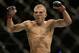 T.J. Dillashaw celebrates after defeating Joe Soto in a bantamweight championship mixed martial arts bout at UFC 177 in Sacramento, Calif., Saturday, Aug. 30, 2014. Dillashaw won by technical knockout in the fifth round to retain his championship. (AP Photo/Jeff Chiu)