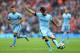 MANCHESTER, ENGLAND - AUGUST 30: David Silva of Manchester City in action during the Barclays Premier League match between Manchester United and Stoke City at Etihad Stadium on August 30, 2014 in Manchester, England. (Photo by Clive Mason/Getty Images)