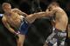 T.J. Dillashaw, left, kicks Joe Soto during the third round of a bantamweight championship mixed martial arts bout at UFC 177 in Sacramento, Calif., Saturday, Aug. 30, 2014. Dillashaw won by technical knockout in the fifth round to retain his championship. (AP Photo/Jeff Chiu)