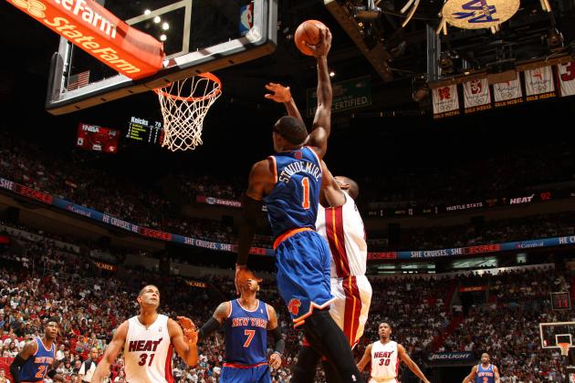 MIAMI, FL - April 6: Amar'e Stoudemire #1 of the New York Knicks drives to the basket against the Miami Heat at the American Airlines Arena in Miami, Florida on April 6, 2014. NOTE TO USER: User expressly acknowledges and agrees that, by downloading and/or using this photograph, user is consenting to the terms and conditions of the Getty Images License Agreement. Mandatory copyright notice: Copyright NBAE 2014 (Photo by Issac Baldizon/NBAE via Getty Images)