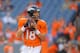 DENVER, CO - AUGUST 23: Quarterback Peyton Manning #18 of the Denver Broncos throws as he warms up before a preseason game at Sports Authority Field at Mile High on August 23, 2014 in Denver, Colorado. (Photo by Justin Edmonds/Getty Images)