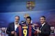 FC Barcelona's Luis Suarez, from Uruguay, center, poses with Barcelona's sports director Andoni Zubizarreta, left, and Barcelona's vice-president Jordi Mestre during a press conference of his presentation at the Camp Nou in Barcelona, Spain, Tuesday, Aug. 19, 2014. Barcelona unveiled Suarez on Tuesday, an event delayed for over five weeks since his transfer from Liverpool due to his latest suspension for biting an opponent at the World Cup. (AP Photo/Manu Fernandez)