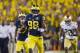 Michigan quarterback Devin Gardner (98) rushes on a break away run in the second quarter of an NCAA college football game with Notre Dame, in Ann Arbor, Mich., Saturday, Sept. 7, 2013. (AP Photo/Tony Ding)