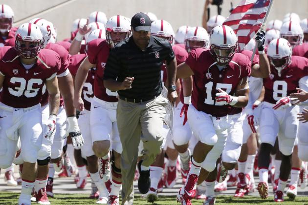 Stanford head coach David Shaw leads his team onto the field during an NCAA college football game against UC Davis on Saturday, Aug. 30, 2014, in Stanford , Calif. (AP Photo/Marcio Jose Sanchez)