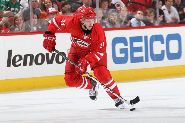 RALEIGH, NC - OCTOBER 06: Drayson Bowman #21 of the Carolina Hurricanes carries the puck during an NHL game against the Philadelphia Flyers on October 6, 2013 at PNC Arena in Raleigh, North Carolina.  (Photo by Gregg Forwerck/NHLI via Getty Images)