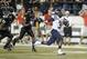 Mississippi running back Jeff Scott (3) scores a touchdown on a 75-yard run with 1:07 left in the fourth quarter to give Mississippi a 39-35 win over Vanderbilt in an NCAA college football game on Friday, Aug. 30, 2013, in Nashville, Tenn. (AP Photo/Mark Humphrey)