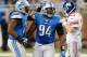 DETROIT, MI - DECEMBER 22: Ezekiel Ansah #94 of the Detroit Lions celebrate a second quarter sack of Eli Manning #10 of the New York Giants with Willie Young #79 at Ford Field on December 22, 2013 in Detroit, Michigan. (Photo by Gregory Shamus/Getty Images)