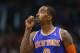 New York Knicks' J.R. Smith looks at the scoreboard during the second half of an NBA basketball game against the Phoenix Suns, Friday, March 28, 2014, in Phoenix. The Suns won 112-88. (AP Photo/Matt York)