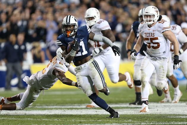 PROVO, UT - SEPTEMBER 7: Jamaal Williams #21 of BYU Cougars runs free as Kendall Sanders #2 and Dominic Espinosa #55 of the Texas Longhorns gives chase during the second half of an NCAA football game September 7, 2013 at LaVell Edwards Stadium in Provo, Utah. BYU beat Texas 40-21. (Photo by George Frey/Getty Images)