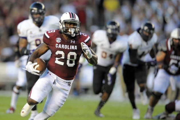 South Carolina running back Mike Davis (28) runs for a touchdown during first half of an NCAA college football game against the East Carolina, Saturday, Sept. 6, 2014, in Columbia, S.C. (AP Photo/Stephen B. Morton)