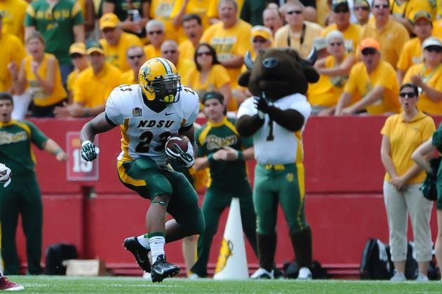 Aug 30, 2014; Ames, IA, USA; North Dakota State Bison running back John Crockett (23) breaks free against the Iowa State Cyclones  at Jack Trice Stadium. Mandatory Credit: Steven Branscombe-USA TODAY Sports
