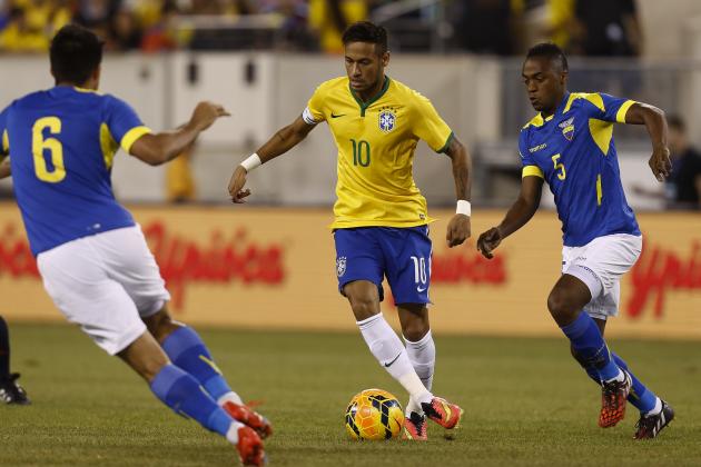 EAST RUTHERFORD, NJ - SEPTEMBER 9 : Neymar Junior #10 of Brazil fights for the ball with Renato Ibarra #5 of Ecuador during their match at MetLife Stadium on September 9, 2014 in East Rutherford, New Jersey. (Photo by Jeff Zelevansky/Getty Images)