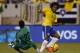 EAST RUTHERFORD, NJ - SEPTEMBER 9 : Willian #19 of Brazil shoots on Alexander Dominguez #22 of Ecuador during their match at MetLife Stadium on September 9, 2014 in East Rutherford, New Jersey. (Photo by Jeff Zelevansky/Getty Images)