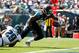 Jacksonville Jaguars' Allen Hurns (88) scores a touchdown as Philadelphia Eagles' Nate Allen (29) hangs on during the first half of an NFL football game, Sunday, Sept. 7, 2014, in Philadelphia. (AP Photo/Matt Rourke)