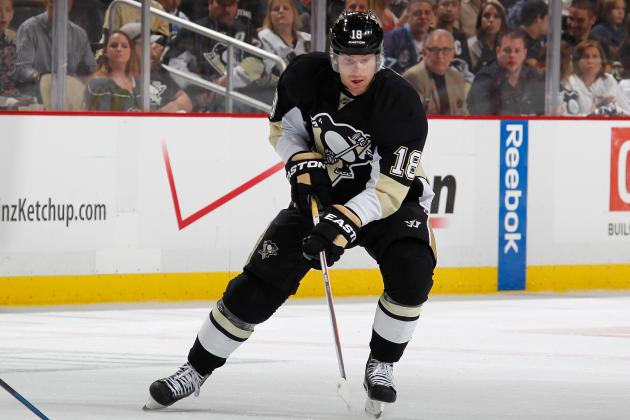 PITTSBURGH, PA - APRIL 19:  James Neal #18 of the Pittsburgh Penguins moves the puck against theColumbus Blue Jackets in Game Two of the First Round of the 2014 Stanley Cup Playoffs at Consol Energy Center on April 19, 2014 in Pittsburgh, Pennsylvania.  (Photo by Gregory Shamus/NHLI via Getty Images)