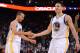 December 3, 2013; Oakland, CA, USA; Golden State Warriors point guard Stephen Curry (30, left) and shooting guard Klay Thompson (11) celebrate during the fourth quarter against the Toronto Raptors at Oracle Arena. The Warriors defeated the Raptors 112-103. Mandatory Credit: Kyle Terada-USA TODAY Sports