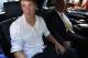 Spanish striker Fernando Torres, left, sits in a car next to AC Milan CEO Adriano Galliani shortly after arriving at Linate airport, Milan, Italy, Saturday, Aug. 30, 2014. Chelsea has agreed terms with AC Milan for Torres to join the Serie A club in a two-year loan deal. The Premier League club and Milan announced the agreement on their websites Friday, adding that