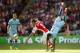 Arsenal's Mathieu Debuchy, left, clashes with a falling Manchester City's Aleksandar Kolarov during the English FA Community Shield soccer match at Wembley Stadium, London Sunday, Aug. 10, 2014. (AP Photo/Alastair Grant)