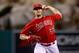 ANAHEIM, CA - SEPTEMBER 17: C.J. Wilson #33 of the Los Angeles Angels of Anaheim pitches against the Seattle Mariners in the fourth inning at Angel Stadium of Anaheim on September 17, 2014 in Anaheim, California. (Photo by Jeff Gross/Getty Images)
